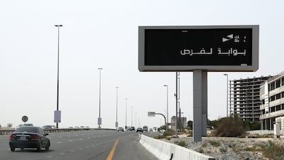 Electronic traffic signs on Umm Sequim St, which is being used to advertise the new Salik IPO scheme in Dubai. Pawan Singh / The National