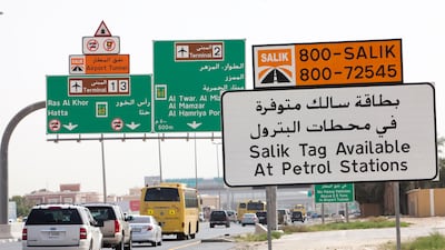 Signs warn drivers that they need a tag on their vehicle to use this road. Jaime Puebla / The National