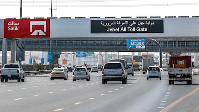 Motorists are required to have a tag on the windscreen of their car and an online account to use the high-speed motorway. Victor Besa / The National