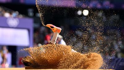 Cuba's Liadagmis Povea in the women's triple jump qualification at the Stade de France on August 2. AFP