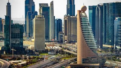 Dubai World Trade Centre (the grey, rectangular building to the middle left) was opened by Queen Elizabeth II in 1979. The tallest building in the UAE until 1999, it appears on the Dh100 banknote. Alamy
