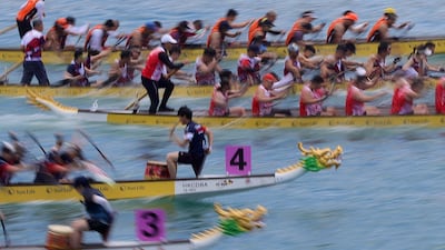 Teams compete during the International Dragon Boat Races at Tsim Sha Tsui East Promenade in Hong Kong, China, on June 7, 2025. AFP
