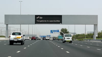 Electronic traffic signs on Al Khail, which is being used to advertise the new Salik IPO scheme in Dubai. Pawan Singh / The National